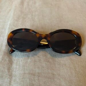 CELINE Triomphe oval frame tortoiseshell acetate sunglasses